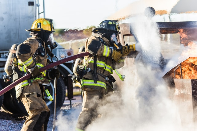 Firefighters trying to extinguish a fire during an emergency call