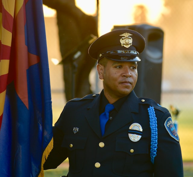 A police officer in a uniform on duty