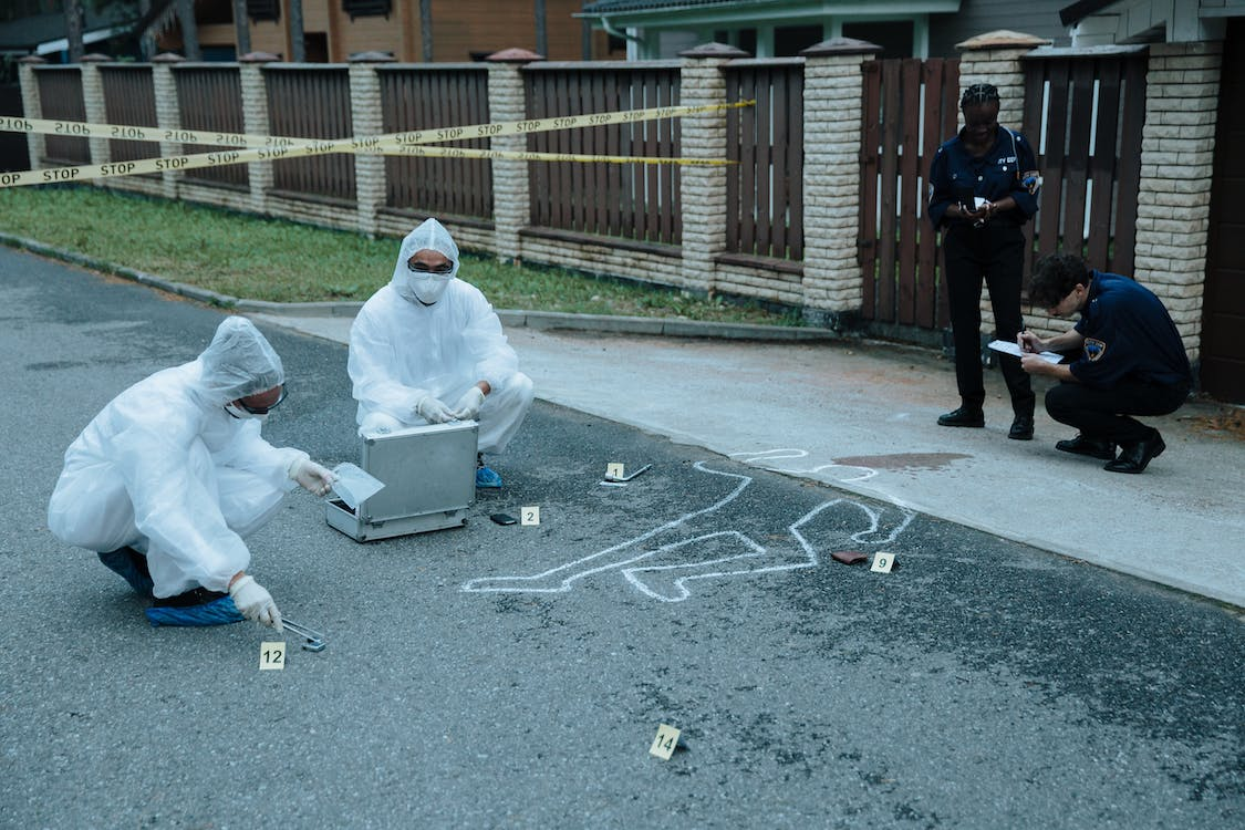 Police officers investigating a crime scene