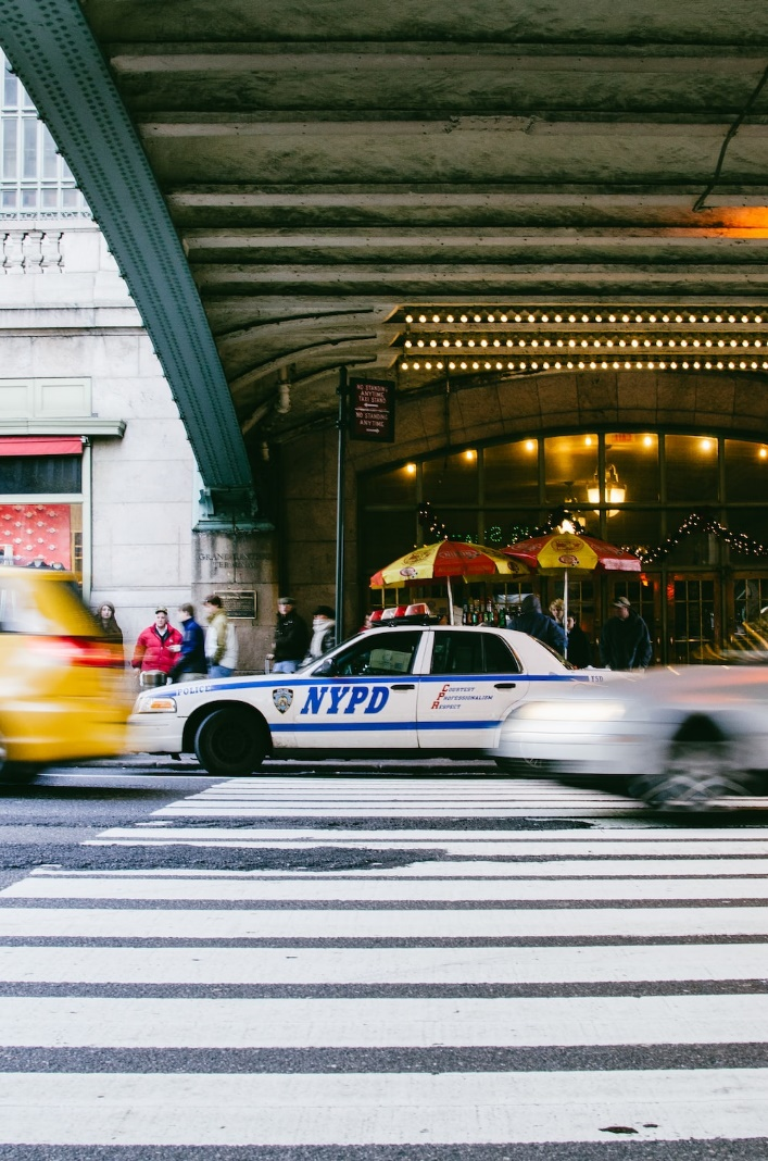 An NYPD car on a road