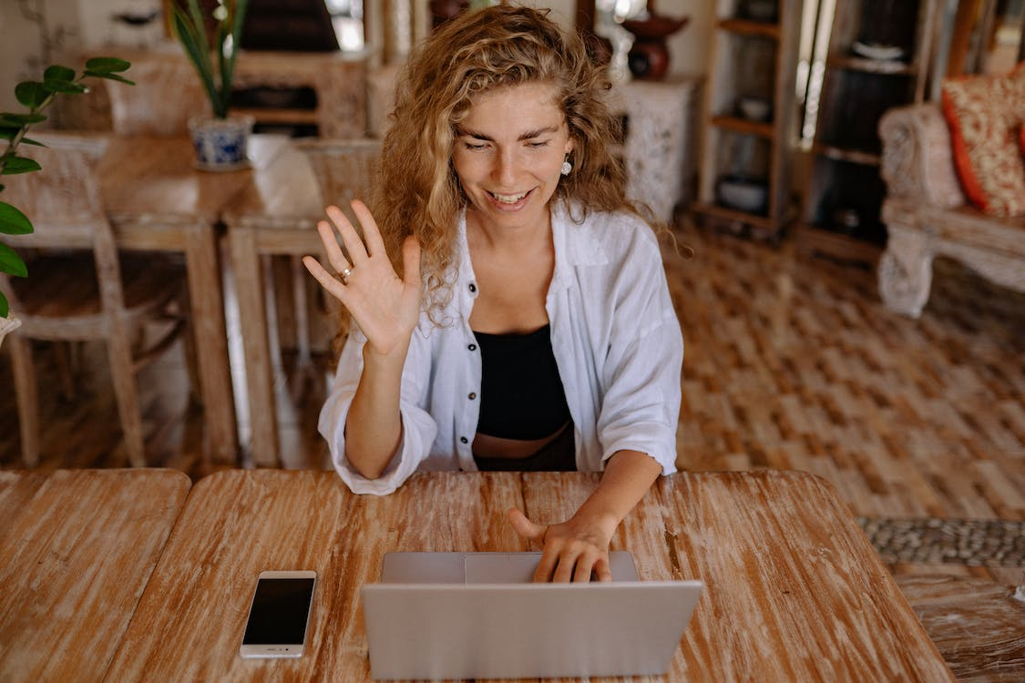 An image of a woman taking online classes